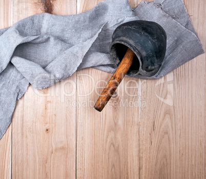 old ceramic pot and red kitchen towel