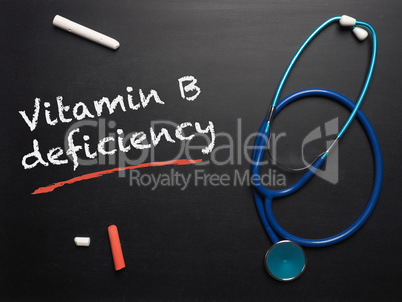 The words Vitamin B deficiency on a chalkboard
