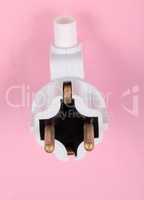 european Outlet Plug on pink background