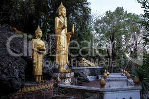 Buddhas along Cave on Holy Mountain Mount Phousi, Luang Prabang, Laos
