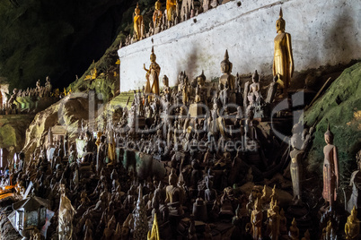 Hundreds of Buddha statues inside Pak Ou Caves, Luang Prabang in Laos