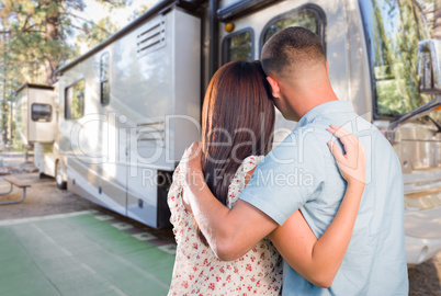 Young Military Couple Looking at New RV