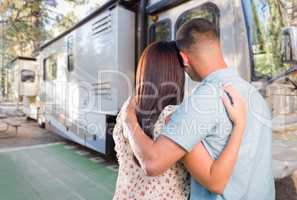 Young Military Couple Looking at New RV