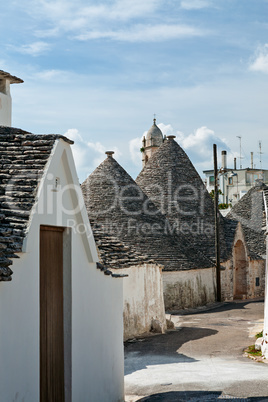 Typical street with Trulli houses in Alberobello, Puglia, Italy