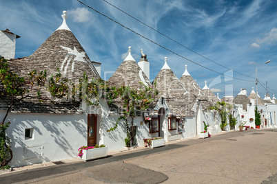 Trulli houses in the shopping street in Alberobello, Puglia, Ita