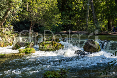 water of the isar in The English Garden, Munich, Germany.