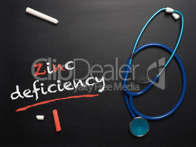 The words zinc deficiency on a chalkboard