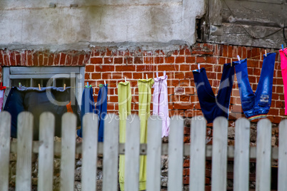 Colorful clothes laundry drying outdoor.