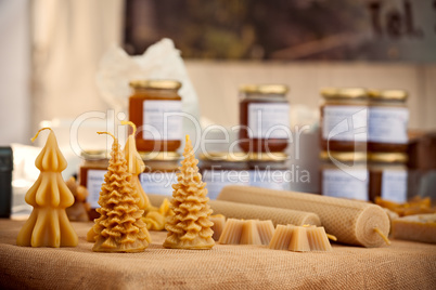 Various handicraft honeycandle over a table