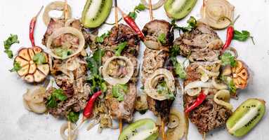 Grilled beef on bamboo skewers