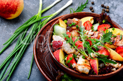 Salad with meat and strawberries