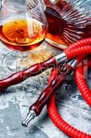 Smoking hookah with cognac flavor