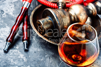 Smoking hookah with brandy flavor