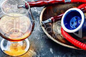 Smoking hookah with brandy flavor