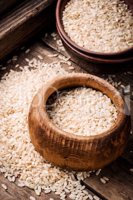 Wooden bowl with rice