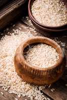 Wooden bowl with rice