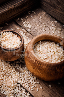 Wooden bowl with rice