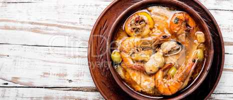Hot seafood soup with fish
