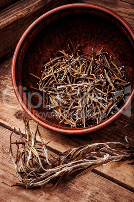 Dried rosemary on vintage background