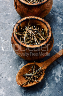 Dried rosemary and wooden spoon