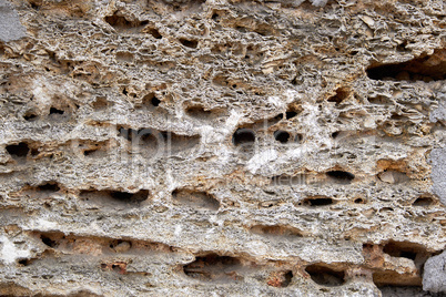 fragment of brown brick block wall