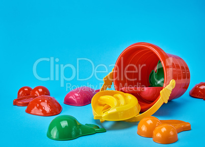 baby plastic red bucket and other items to play