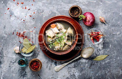 Ceramic bowl with fish soup