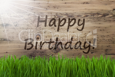 Sunny Wooden Background, Grass, Text Happy Birthday