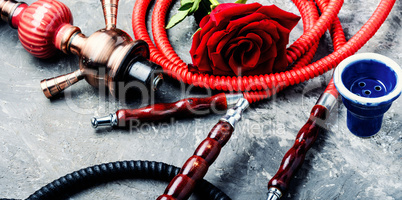 Smoking hookah with rose flavor