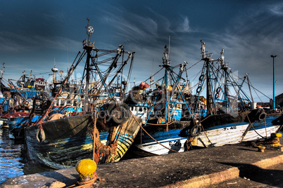 Lots of blue fishing boats in the port of Essaouira, Morocco