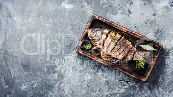 Carp stuffed with vegetables