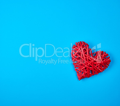 wicker red heart on a blue background