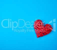 wicker red heart on a blue background