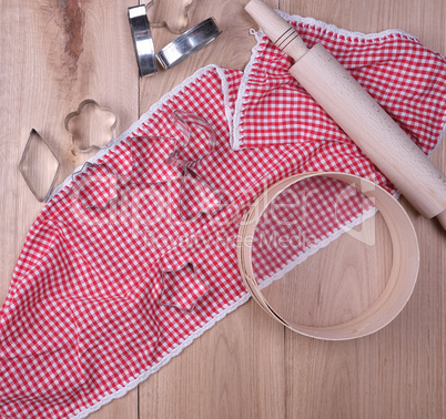 wooden kitchen items on a red towel