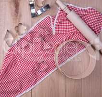 wooden kitchen items on a red towel