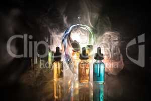 Vape concept. Smoke clouds and vape liquid bottles on dark background. Light effects. Useful as background or electronic cigarette advertisement.