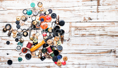 Various sewing buttons and thread