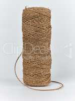 spool-wrapped brown rope of jute