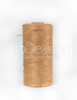 coiled brown rope on white background