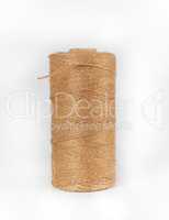 coiled brown rope on white background