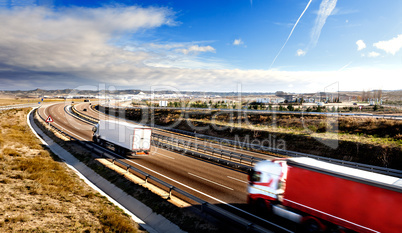 Trucks and highway.