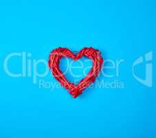 wicker red heart on a blue background