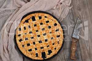 baked round black currant cake