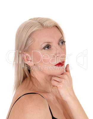 Portrait of a beautiful blond woman looking away