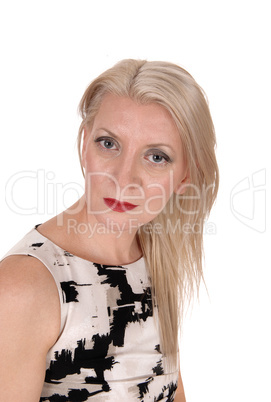 Portrait of a lovely blond woman with blue eyes