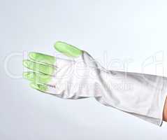 hand in a white-green rubber glove