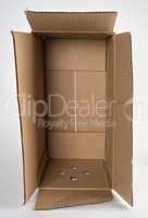 open brown paper box on white background