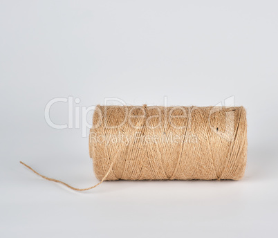 brown rope of jute, white background