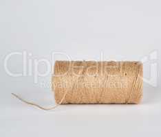 brown rope of jute, white background