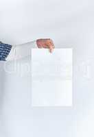 man hand holding a blank rectangular white paper sheet